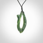 Hand carved contemporary jade broken sea shell jewellery. Made by Donna Summers for NZ Pacific from New Zealand greenstone. Authentic jade jewellery for sale online. These are a beautiful and feminine necklace and would make the perfect gift for the women in your life.